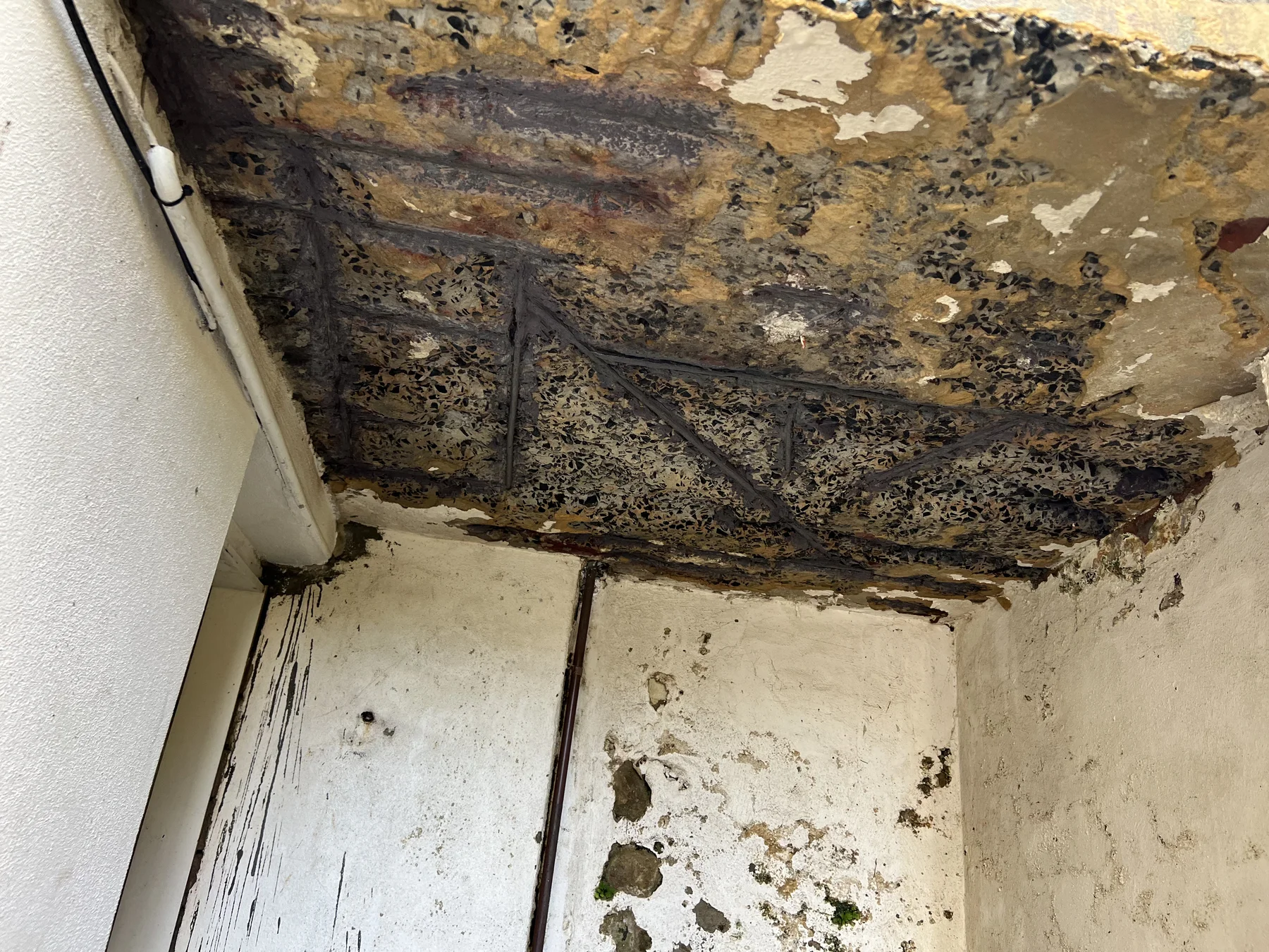 Detail of deterioration beneath the stair landing